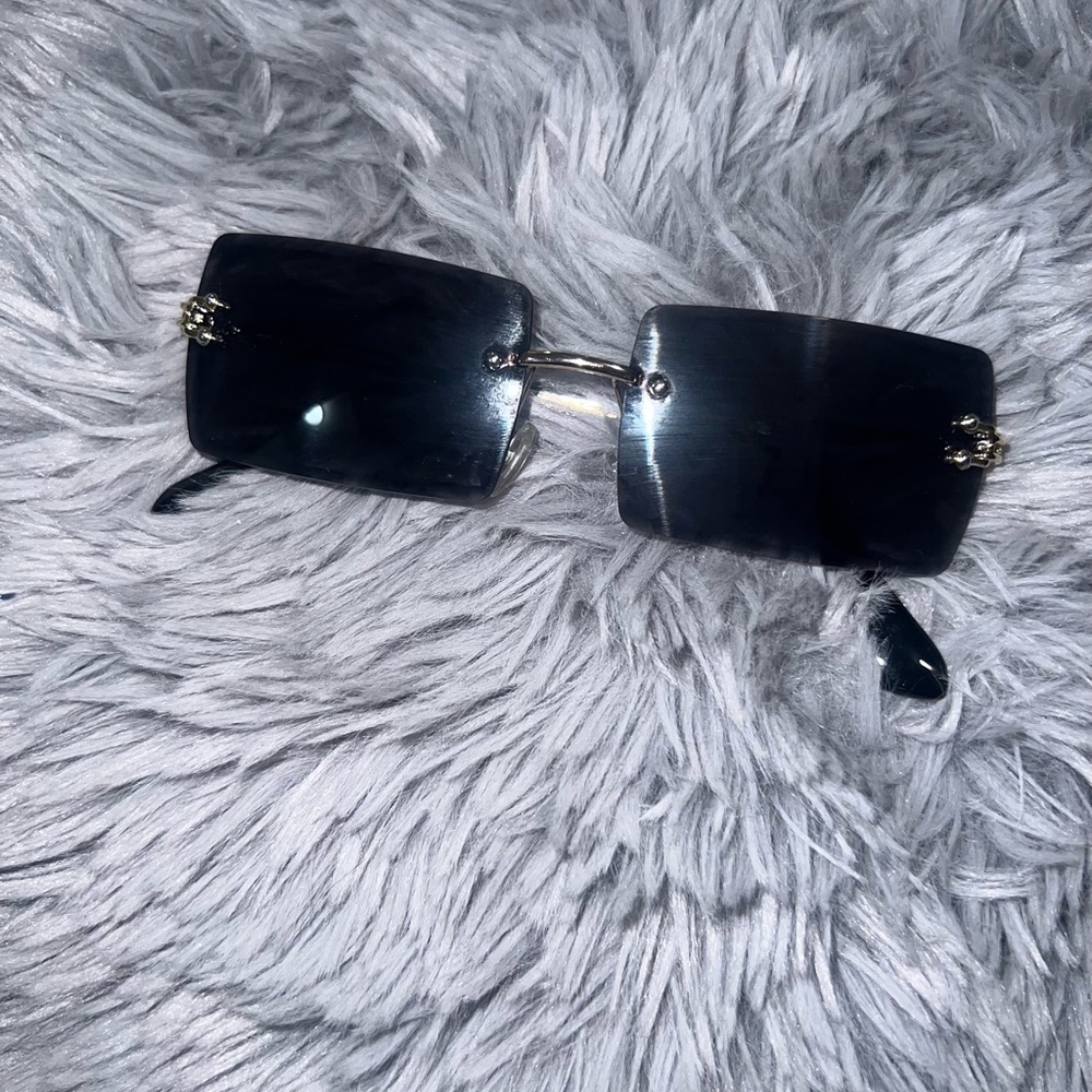 Sunglasses.   (Cartier INSPIRED)